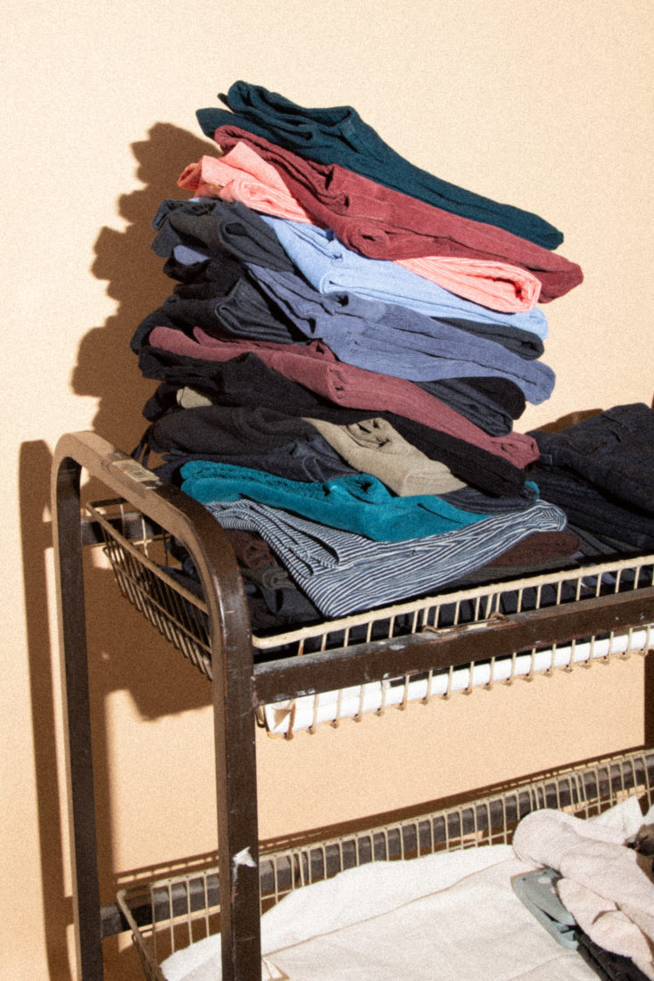Pile of jeans, folded in a stack